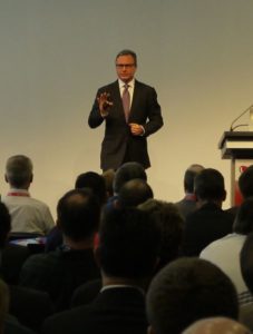Figure 1. Silicon Labs’ CEO Tyson Tuttle presents the opening keynote address at Embedded World 2015 to a standing-room only crowd.